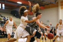 Spring Valley’s Lynnae Wilds, left, guards Faith Lutheran’s Maddy Larson during a NIAA D ...