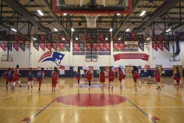 The Liberty girls basketball team warms up during practice at Liberty High School in Las Veg ...