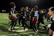 Centennial players celebrate their 25-20 victory over Foothill in the CCSD Division I Flag ...