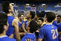 Bishop Gorman players celebrate after defeating Coronado 83-63 in the NIAA Division I state ...