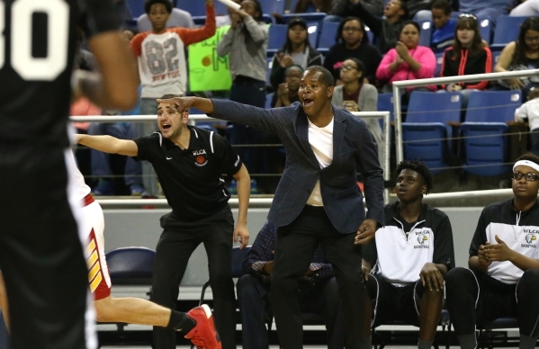 Word of Life Head Coach Percy Lockett works the sidelines of the NIAA Division IV state bask ...