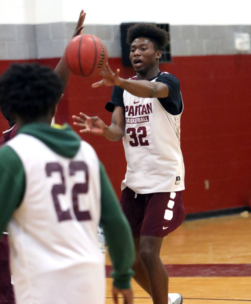 Cimarron-Memorial’s Brian Washington passes the ball during teams practice at their sc ...