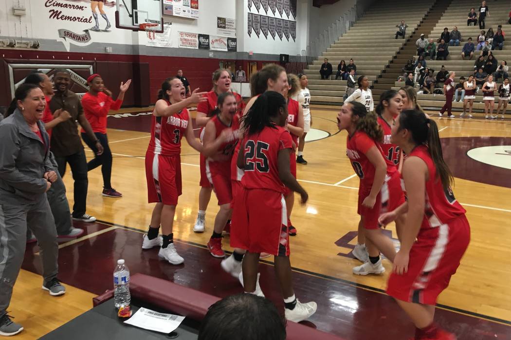 Arbor View’s girls basketball team celebrates after edging Cimarron-Memorial on the ro ...