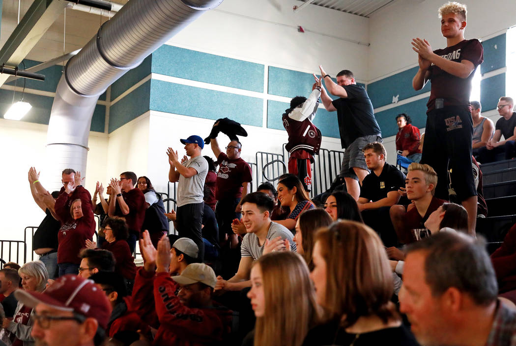 Crowds cheer on Saturday during the Sunset Region Wrestling Finals at Centennial High School ...
