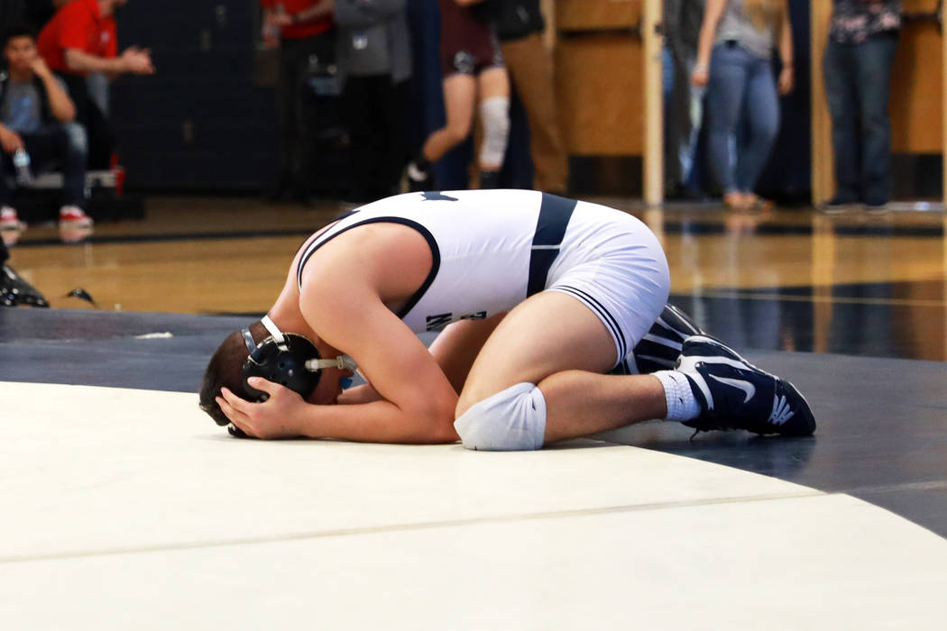 Matthew Van Riel, of Shadow Ridge High School, reacts after being defeated by Nathanial Rodr ...