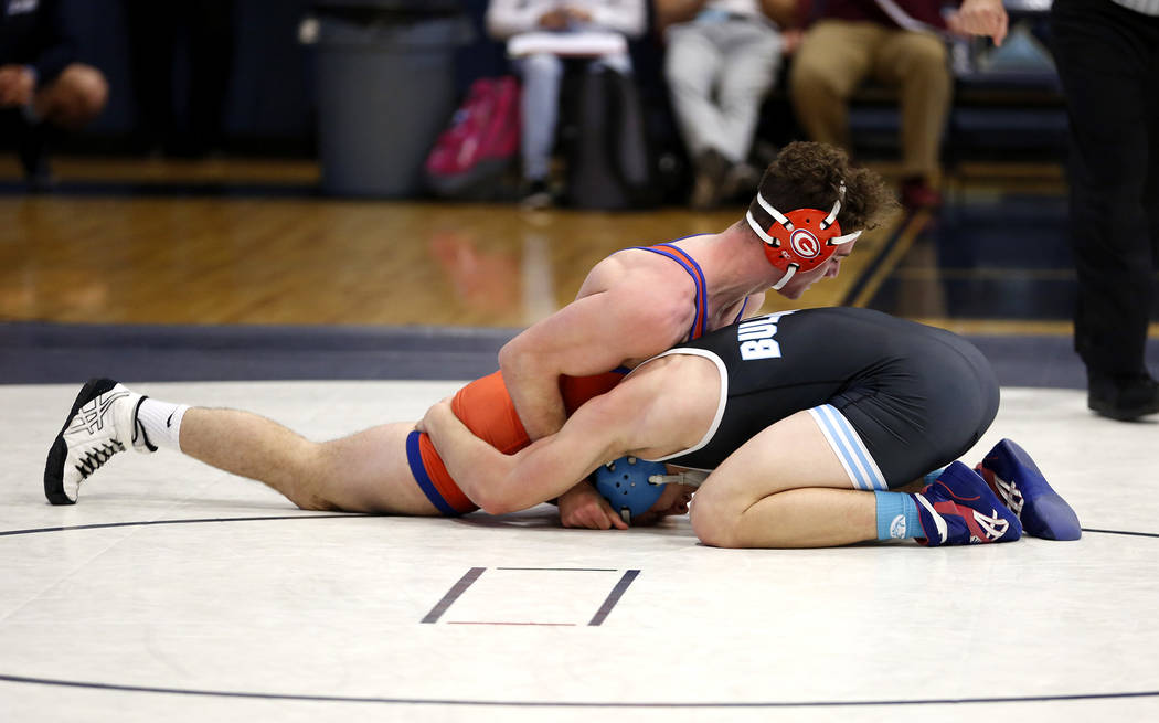Joey Mazzara, of Bishop Gorman High School, pins down his opponent on Saturday during the Su ...
