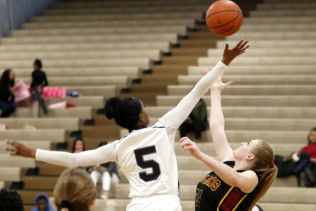 Cheyenne High’s Brielle Jefferson (5) reaches for the ball during a basketball game at ...