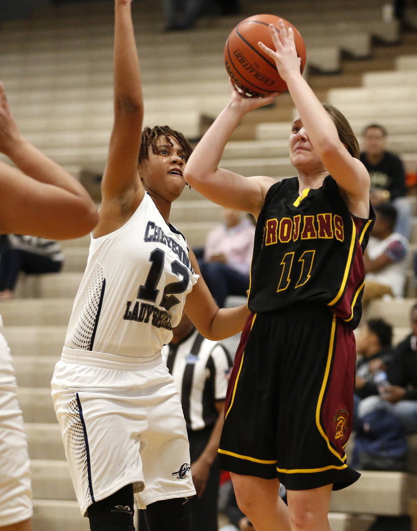 Pahrump Valley’s Jackie Stobbe (11) throws the ball against Cheyenne High’s Raja ...