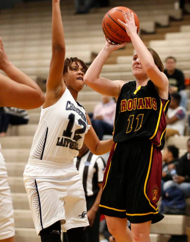 Pahrump Valley’s Jackie Stobbe (11) throws the ball against Cheyenne High’s Raja ...