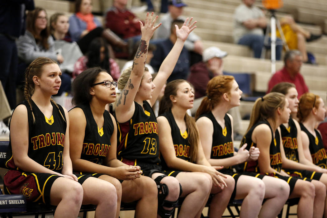 Pahrump Valley’s Sabin Chaidez (13) reacts after a player during a basketball game at ...