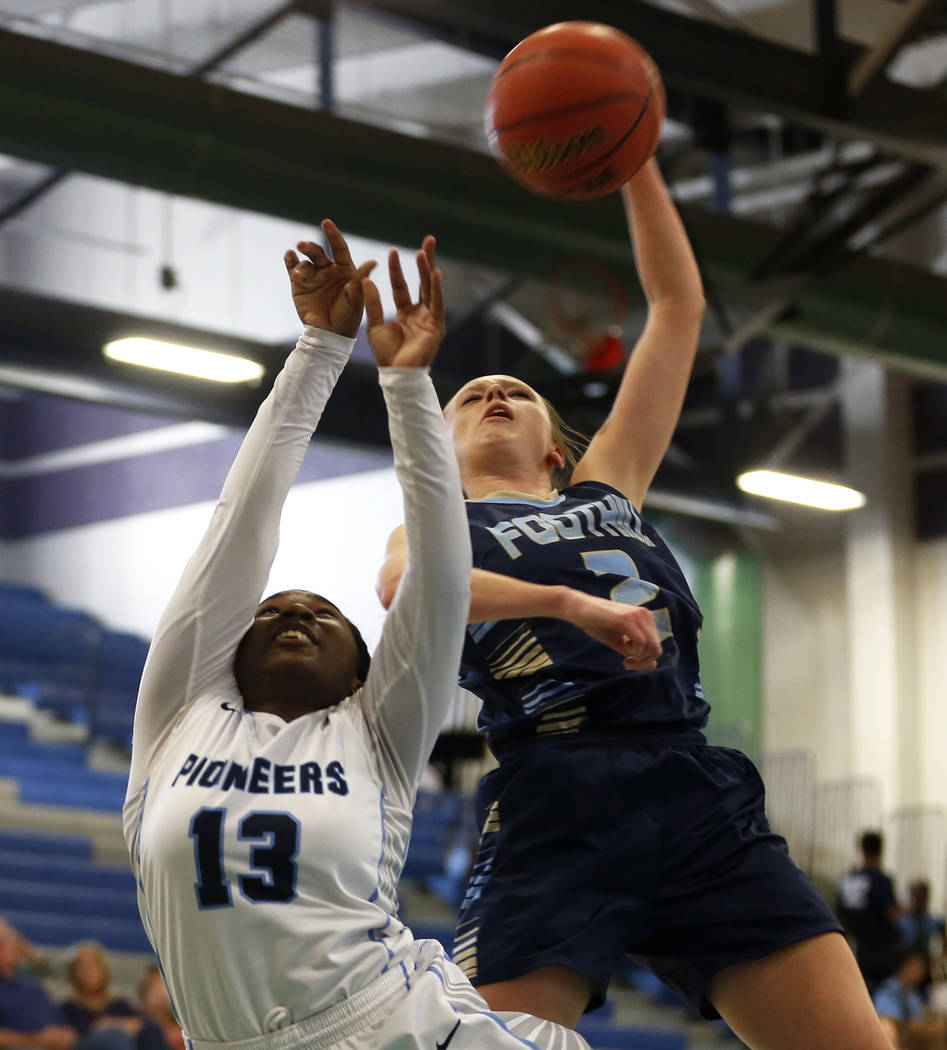 Canyon Springs’ Ke’Ajanae Haley (13) defends against Foothill’s Aqui Willi ...