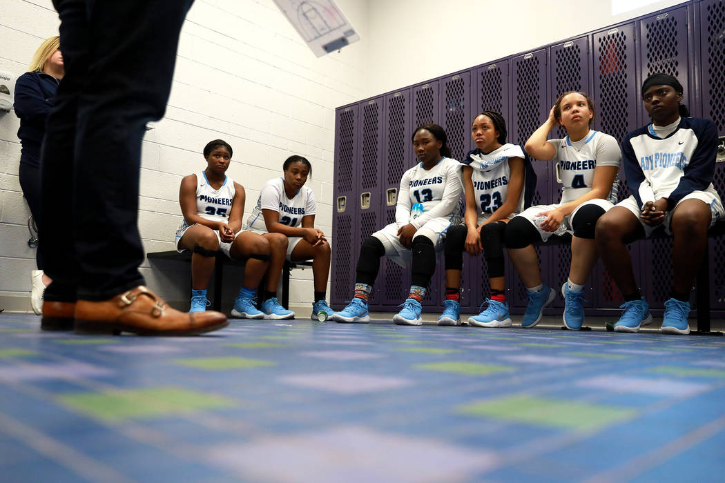 The Canyon Springs girls basketball team talks in the locker room during the Sunrise Region ...