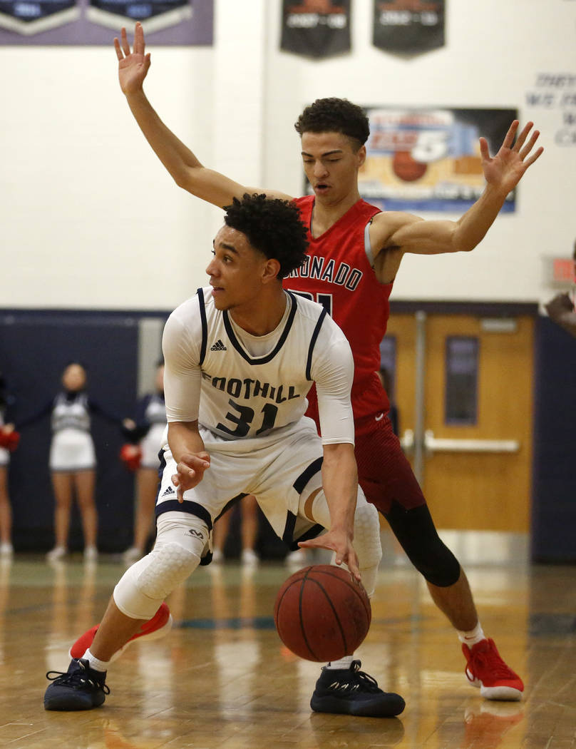 Foothill’s Marvin Coleman (31) defends against Coronado’s Max Howard during the ...
