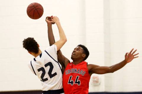 Coronado’s Taieem Comeaux (44) reaches for the ball against Foothill’s Jace Roqu ...