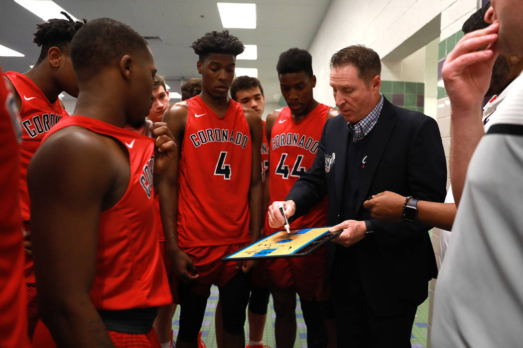 Coronado head coach Jeff Kaufman talks to his team during the Sunrise Region semifinals agai ...