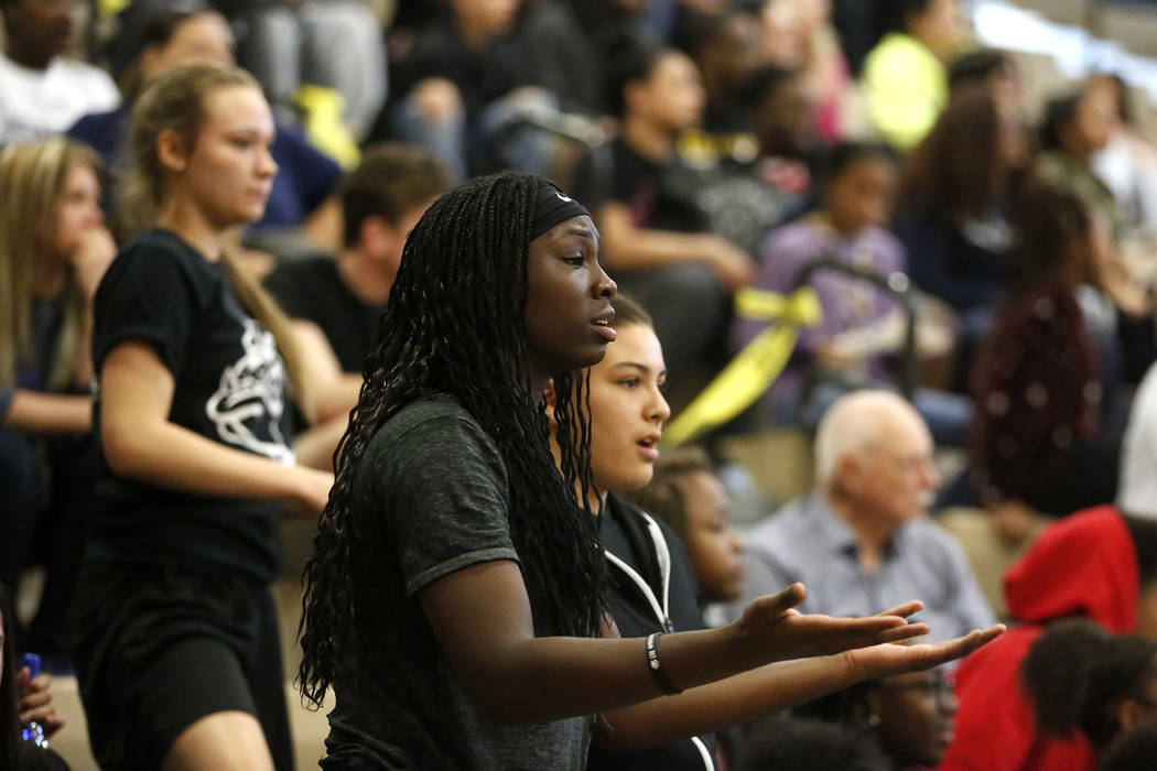 Fans react during the Sunset Region girls basketball championship at Legacy High School in N ...