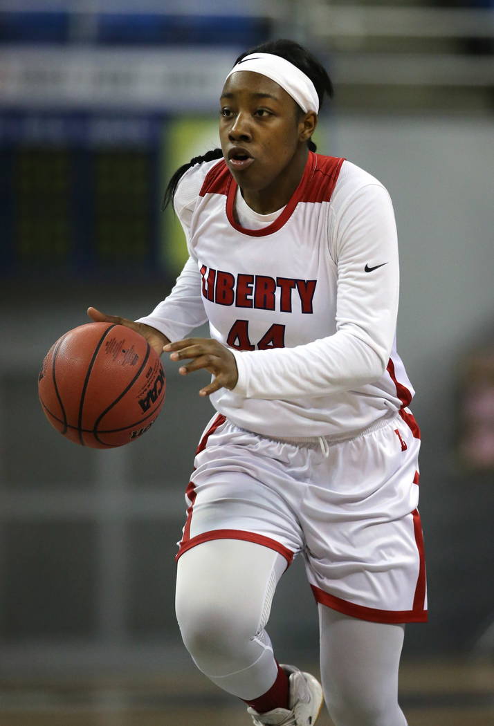 Liberty’s Dre’una Edwards had 28 points and 11 rebounds against McQueen during t ...