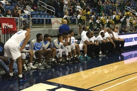 Canyon Springs’ bench reacts in the final seconds of its game against Bishop Manogue i ...