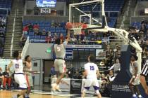 Bishop Gorman’s Jamal Bey goes up for a shot during the team’s Class 4A state se ...
