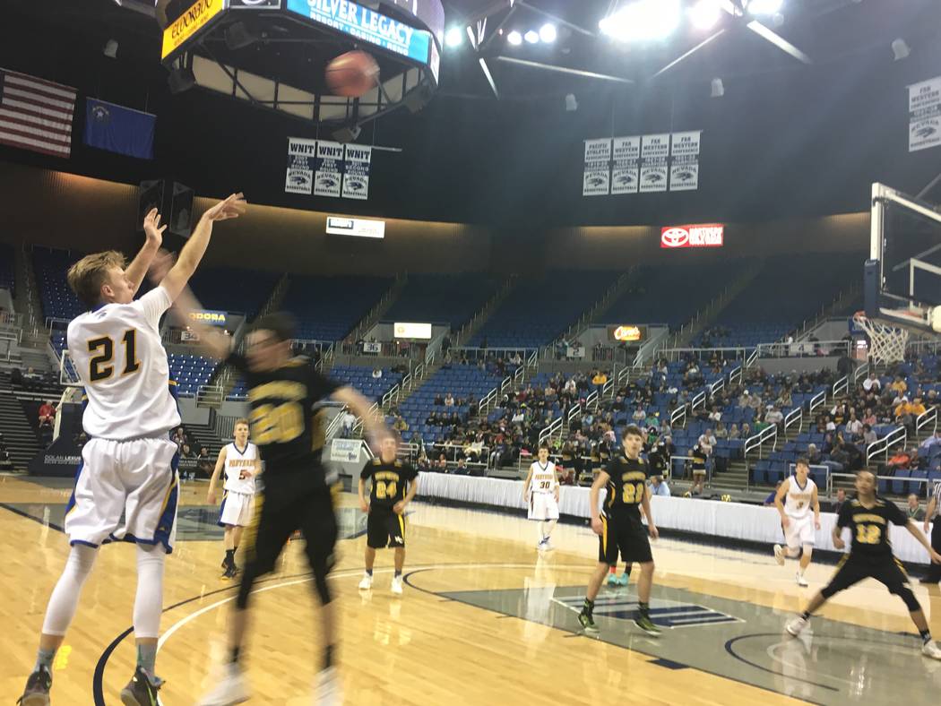 Culen Highbe shoots a 3-pointer against Mineral County in the the Class 1A state semifinals ...
