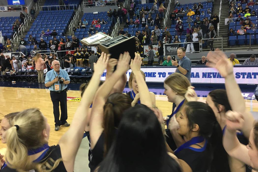 Pahranagat Valley players celebrate their 58-43 win over Wells for the Class 1A girls state ...