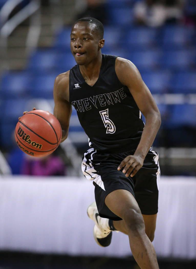 Cheyenne’s Kavon Williams runs the ball during the NIAA 3A state basketball championsh ...
