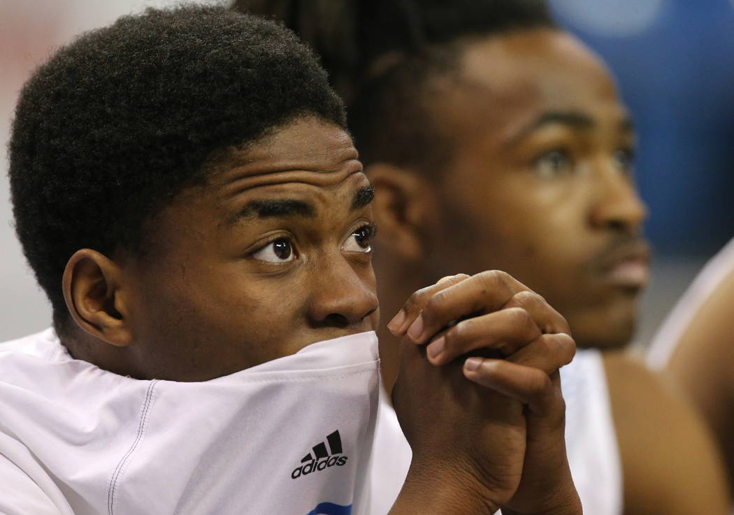 Desert Pines’s Laronte Dorsey watches the action in the NIAA 3A state basketball champ ...