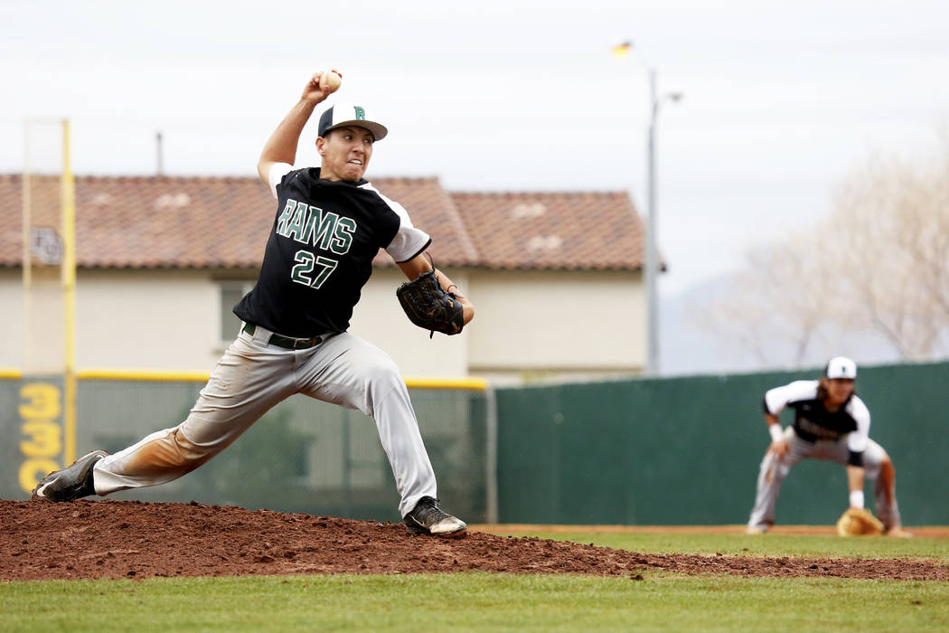 Rancho Rams’ Anthony Guzman (27) pitches against the Arbor View Aggies at Desert Oasis ...