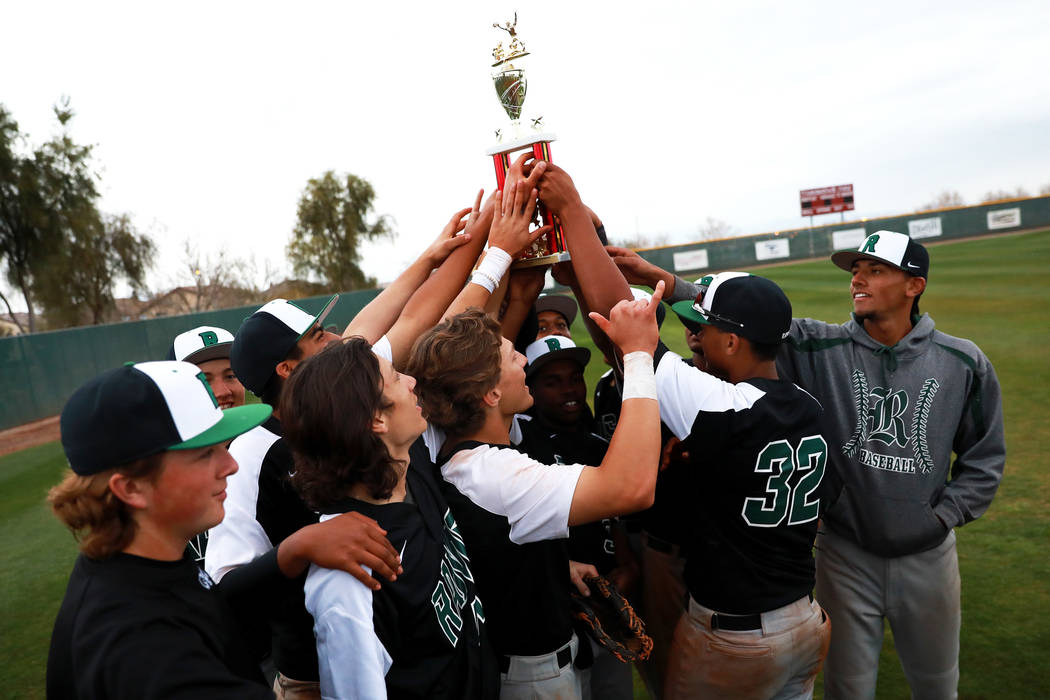 The Rancho Rams baseball team celebrates after beating the Arbor View Aggies at Desert Oasis ...