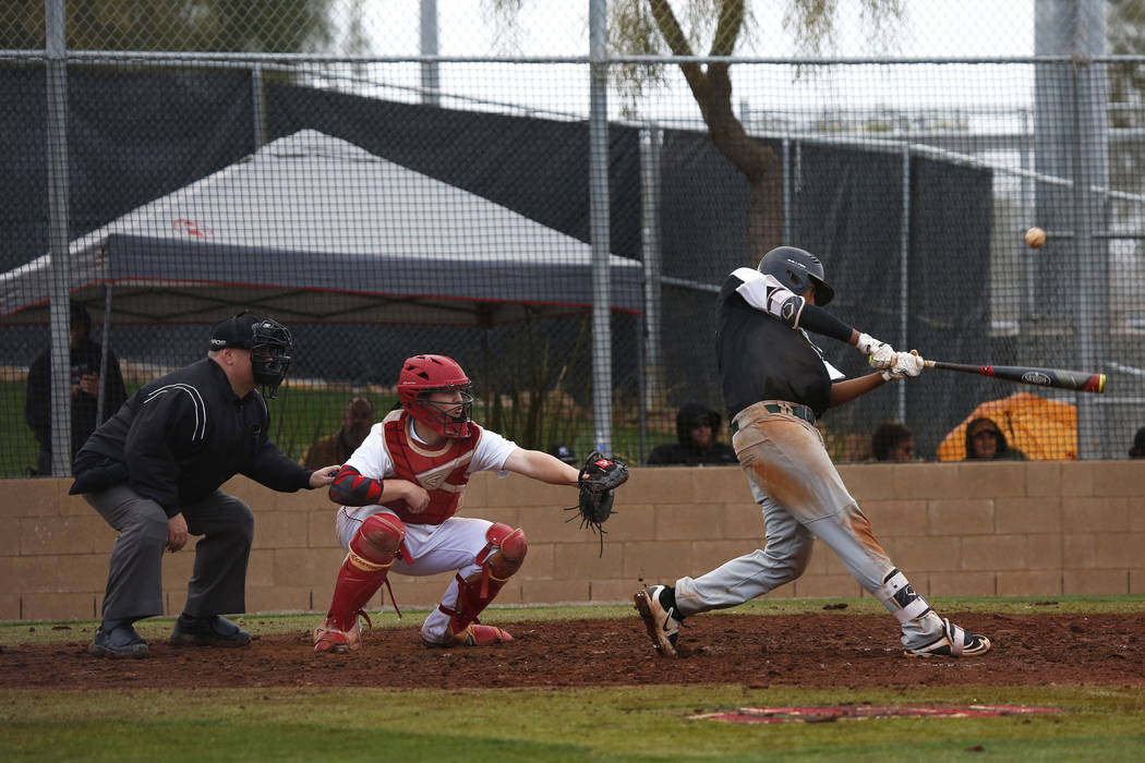 Rancho Rams’ Jimmy Gamboa (99) swings during a game against the Arbor View Aggies at D ...