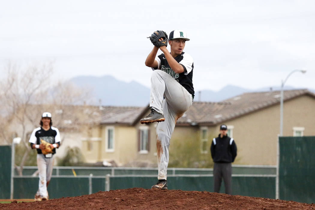 Rancho Rams’ Anthony Guzman (27) pitches against the Arbor View Aggies at Desert Oasis ...