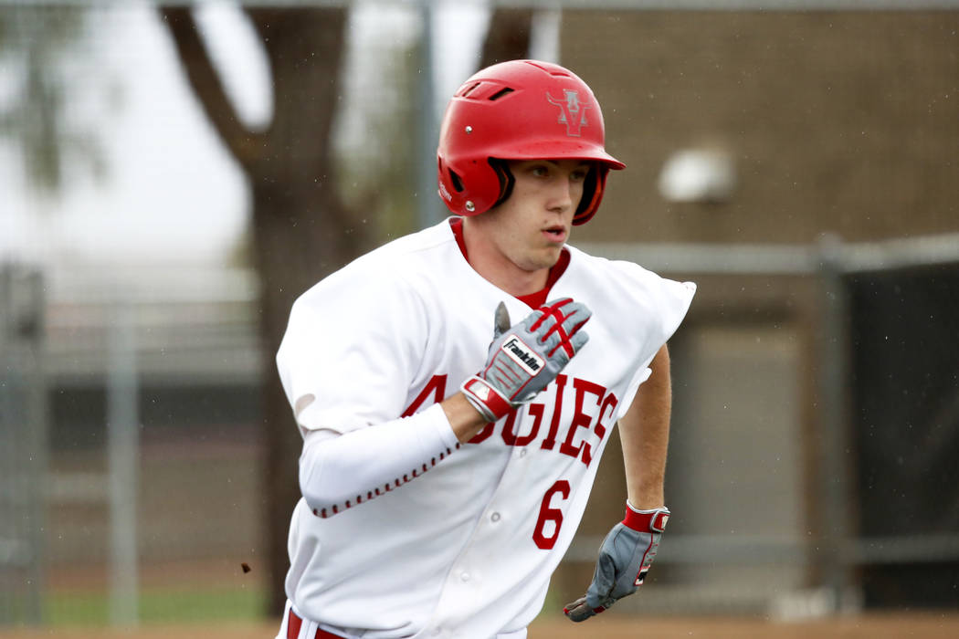 Arbor View Aggies’ Ryan Lystlund (6) runs to second base against the Rancho Rams at De ...