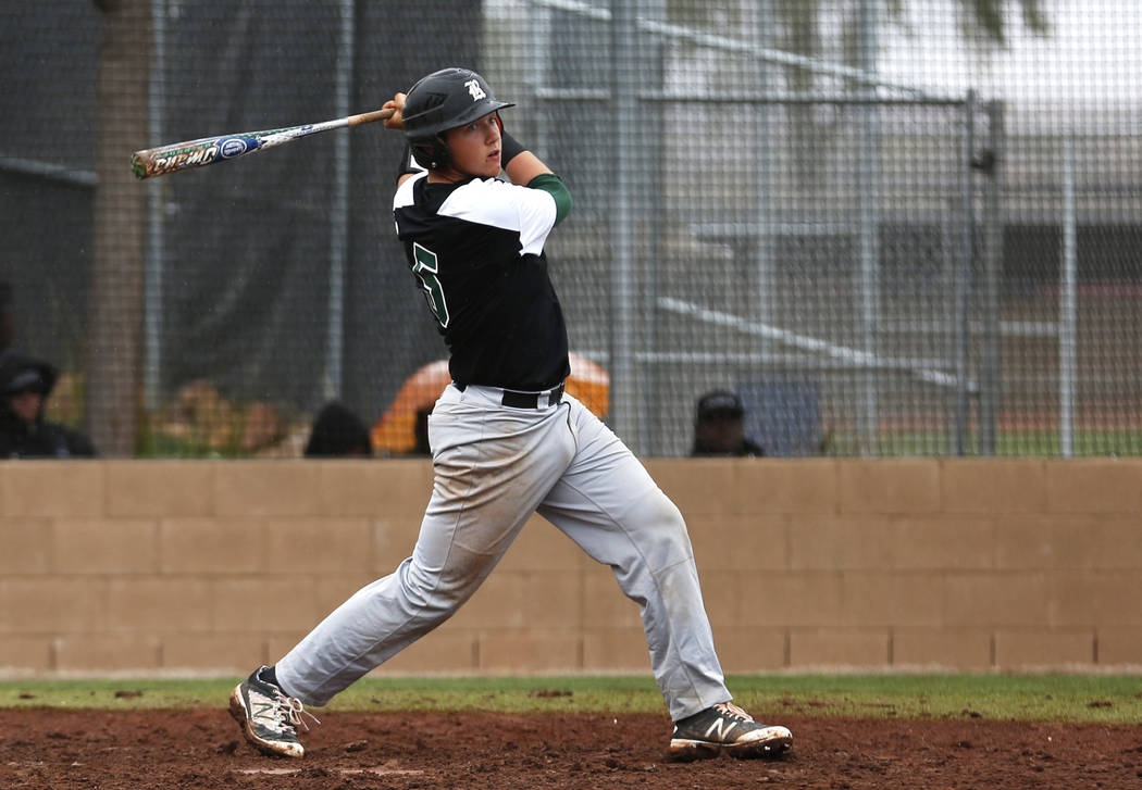 Rancho Rams’ Matthew Baughn (5) swings during a game against the Arbor View Aggies at ...