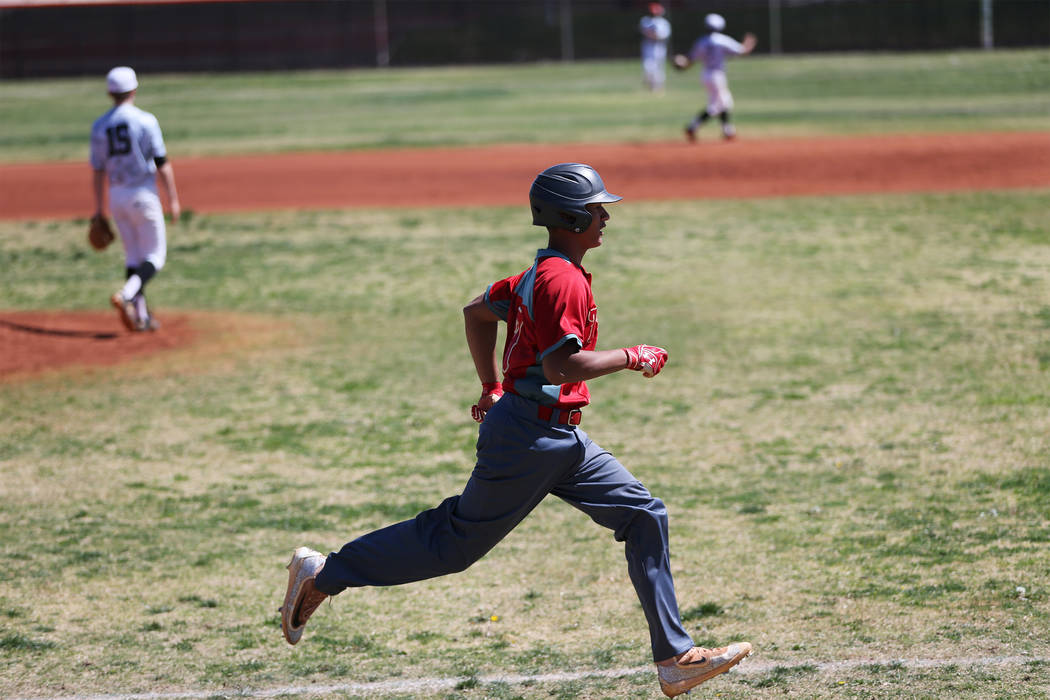 Southeast Career Tech’s Andre Nevarez (7) runs to first base for a single in the fifth ...