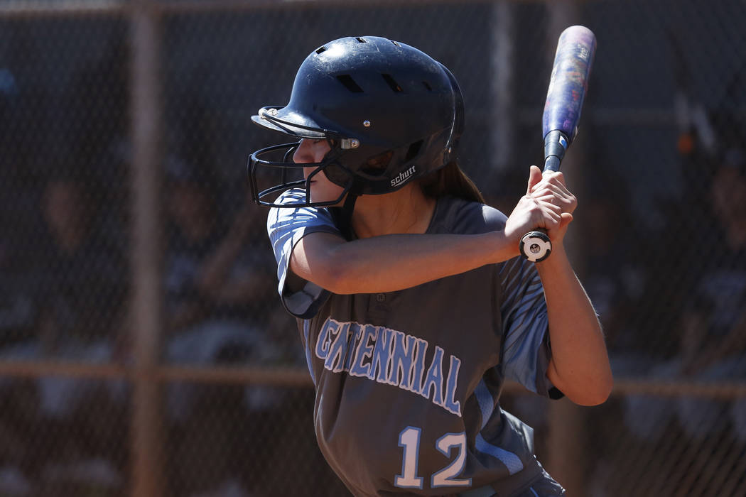 Centennial’s outfielder Abby Hanley (12) bats against North High School in the third i ...