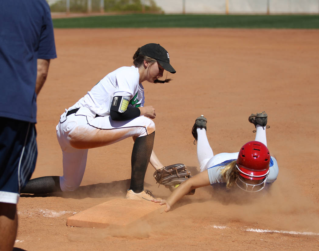 Palo Verde’s Makena Martin tags Isabella Gilbreth of San Diego who is safe at first in ...
