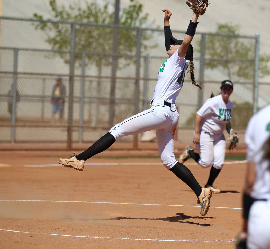 Palo Verde pitcher Makena Martin pulls in a fly ball in the third inning of a softball game ...