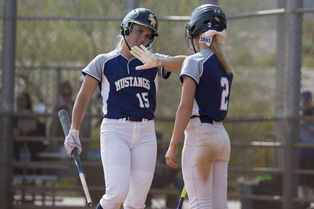 Shadow Ridge’s Mia Voges celebrates her score with Raelyn Kendall (2) against El Camin ...