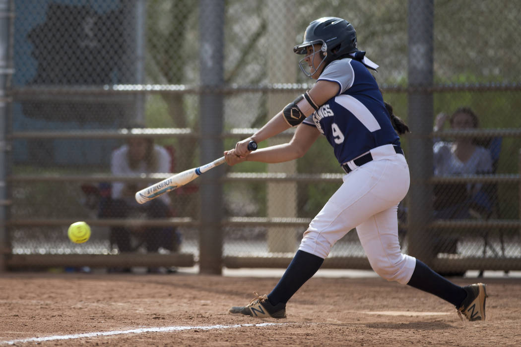 Shadow Ridge’s Mariah Castellaonos (9) connects with the ball for a base hit against E ...