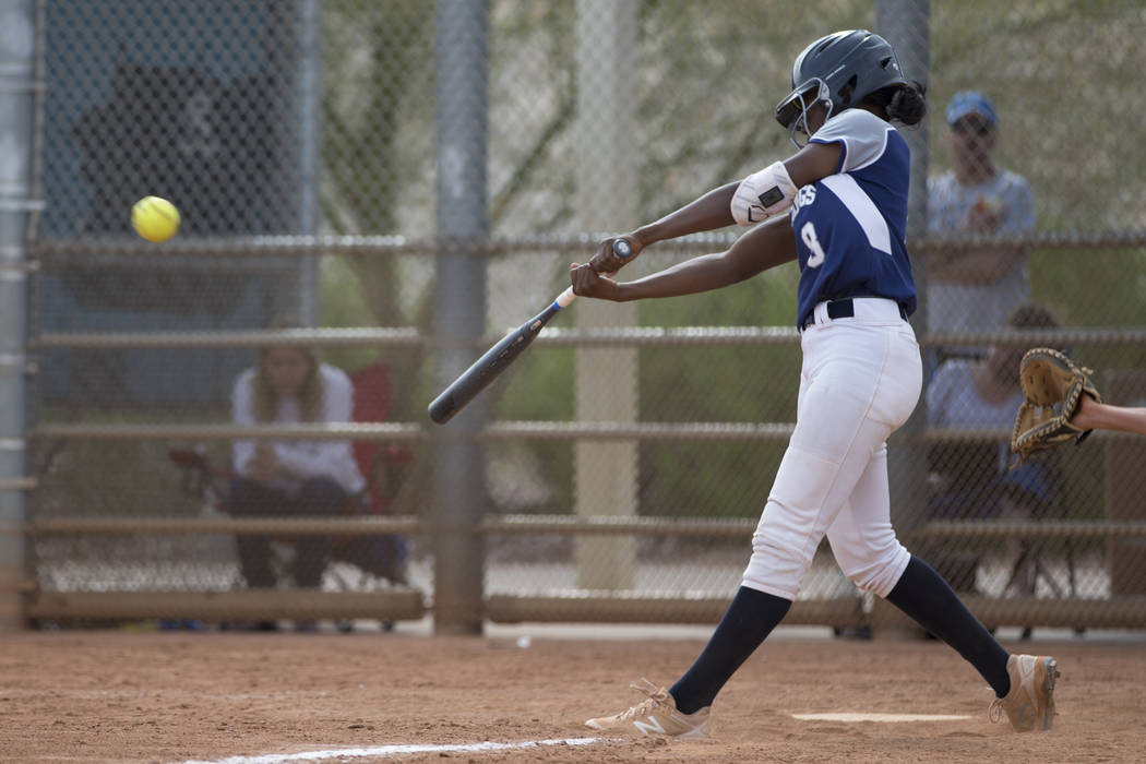 Shadow Ridge’s Jasmine Martin (8) connects for a base hit against El Camino Real durin ...