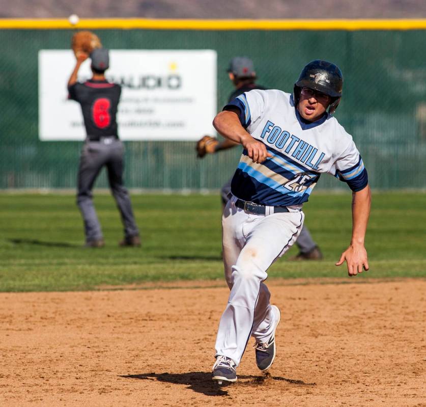 Foothill’s Tommy Dirk runs toward third base during the fourth inning of a baseball ga ...