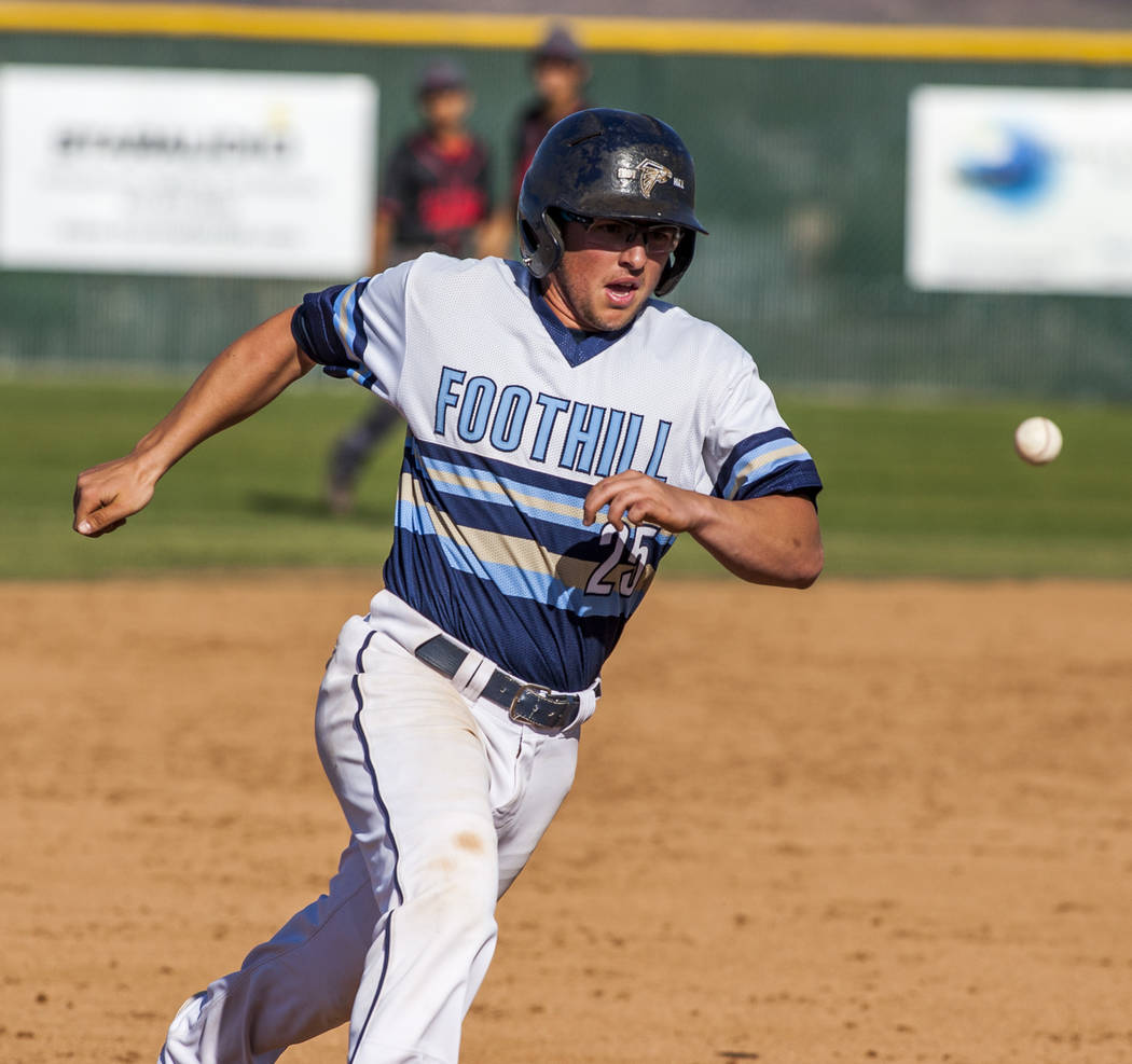 Foothill’s Tommy Dirk runs toward third base during the fourth inning of a baseball ga ...