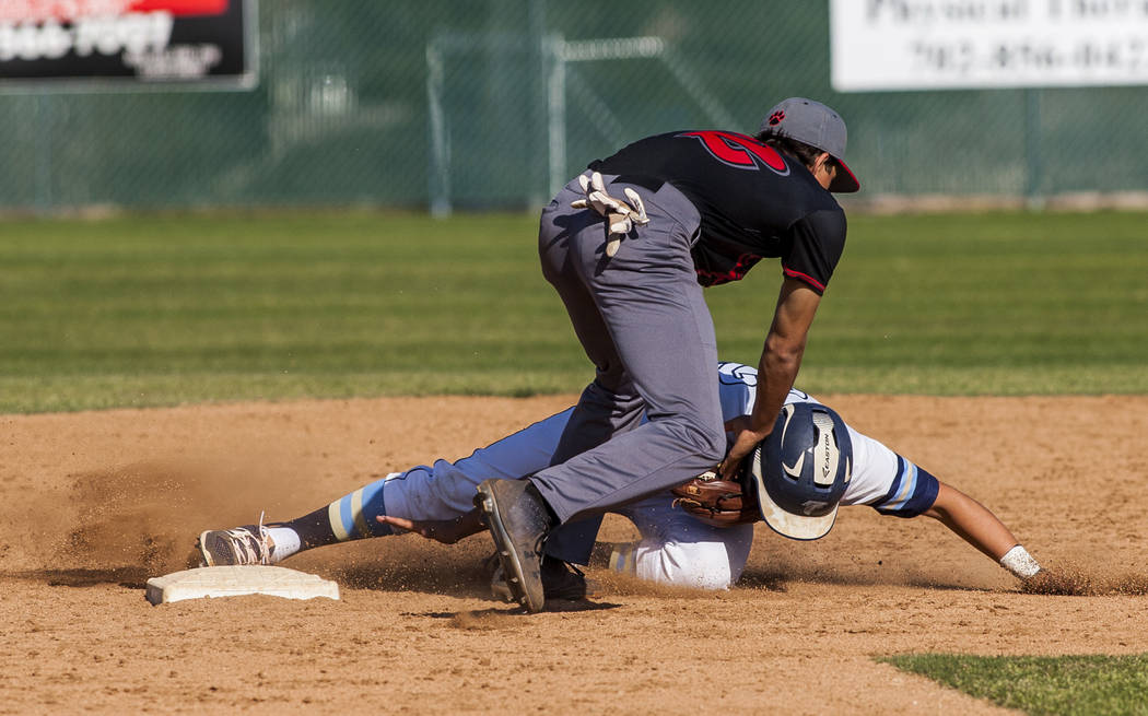 Las Vegas infielder Nathan Freimuth tags out Foothill’s Jake Perales at second during ...