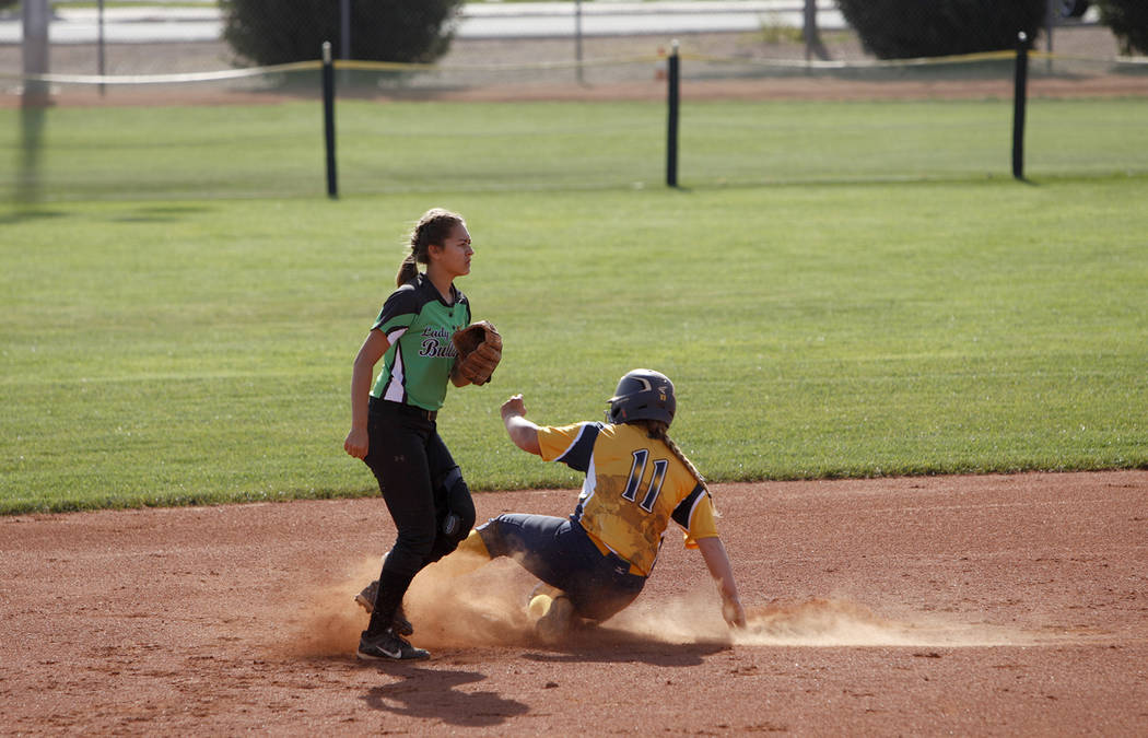 Boulder City High School’s Lily Ofman (11) slides to second plate as Virgin Valley Hig ...
