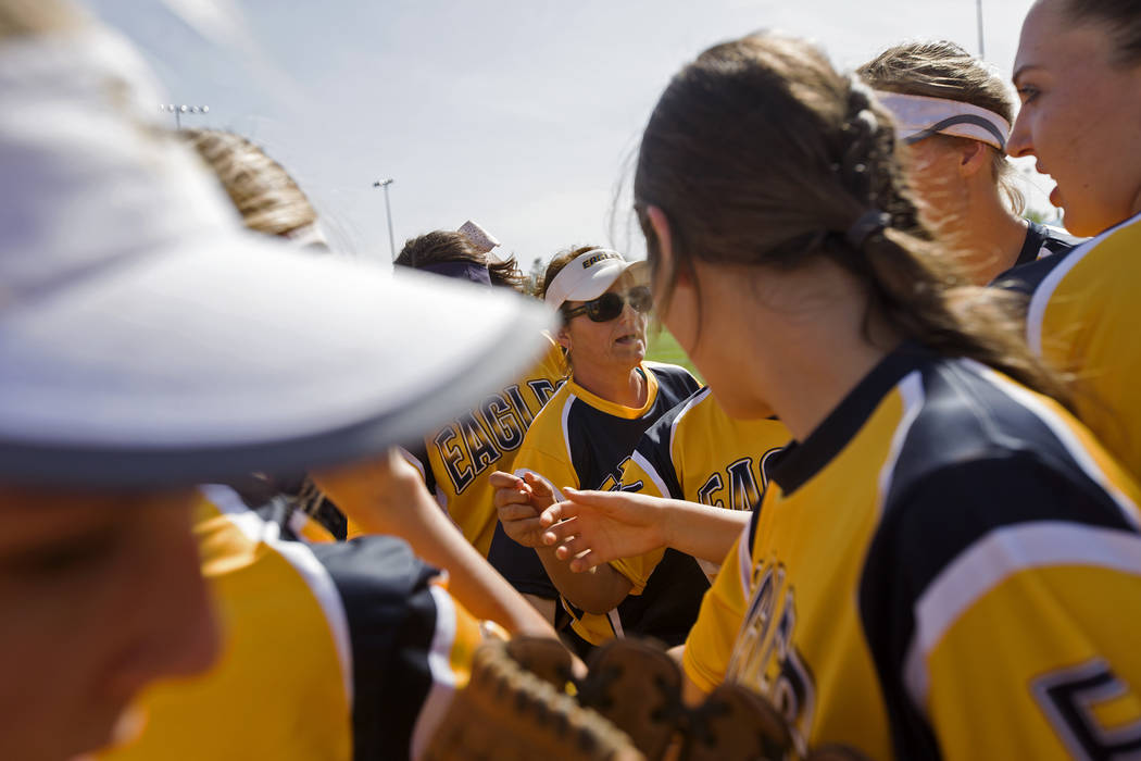 Boulder City High School softball coach Angelica Moorhead preps her team before the start of ...