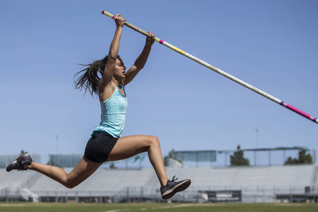 Gabby Carson, one of Nevada’s top prep pole vaulters, works on her technique during pr ...