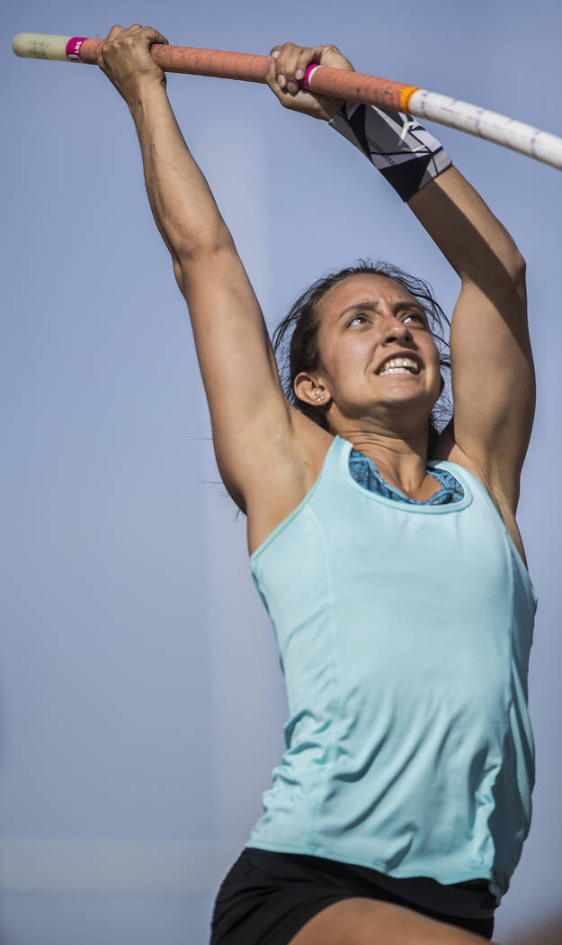 Gabby Carson, one of Nevada’s top prep pole vaulters, plants her pole and prepares to ...