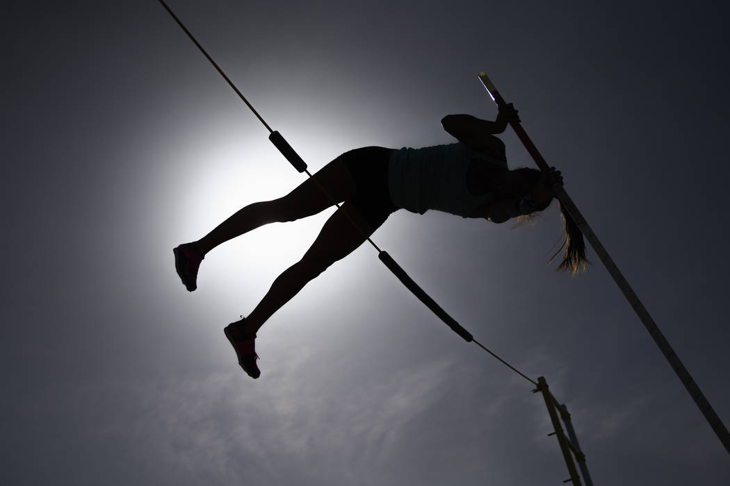 Gabby Carson, one of Nevada’s top prep pole vaulters, works on her "fly-away&quot ...