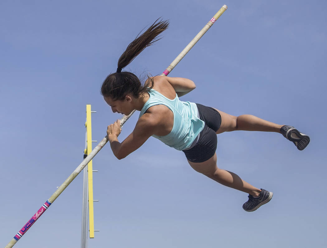 Gabby Carson, one of Nevada’s top prep pole vaulters, works on her technique during pr ...