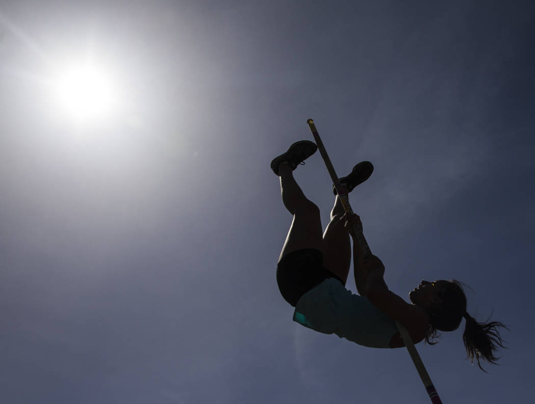 Gabby Carson, one of Nevada’s top prep pole vaulters, works on her technique during pr ...